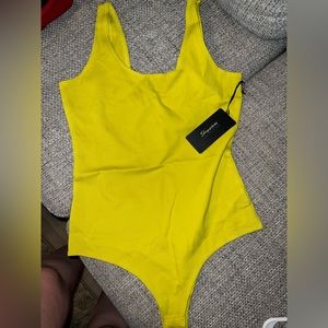 Brand new bodysuit, size large